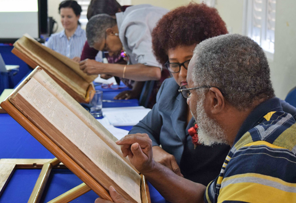 Workshop using The Barbados Mercury Gazette at the Barbados Archive. Courtesy of the Endangered Archives Programme.